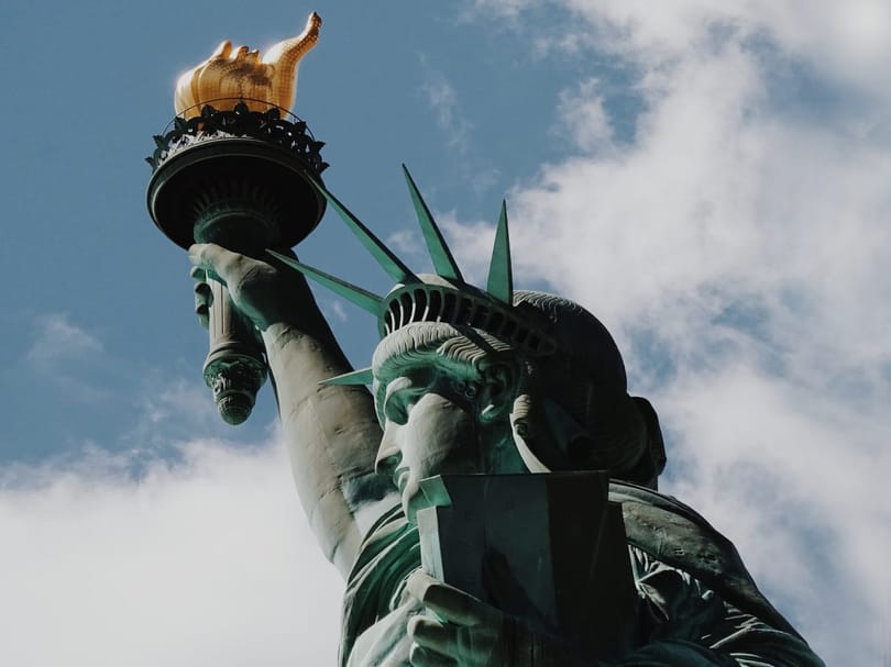 Close-up view of the Statue of Liberty holding her torch