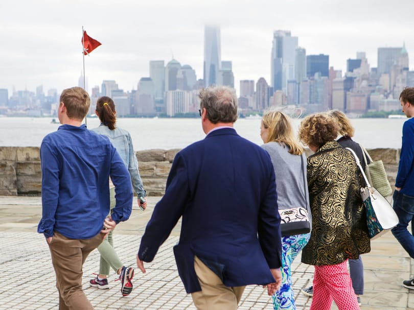 tour group at the statue of liberty