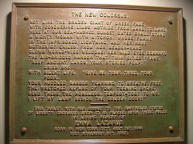 Bronze plaque of Emma Lazarus's poem The New Colossus at the Statue of Liberty