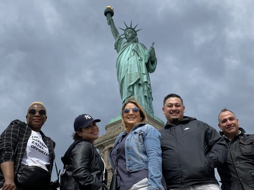 Group photo in front of the statue
