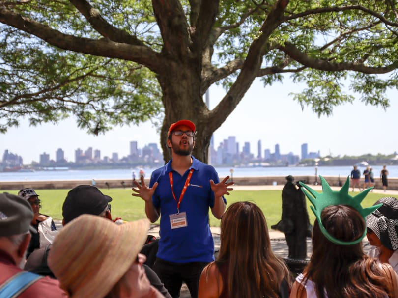Tour guide and group during Statue of Liberty and Ellis Island tour