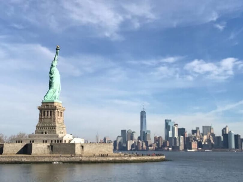 Statue of Liberty with the Lower Manhattan skyline in the background