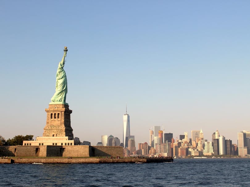 statue of liberty, new york skyline view