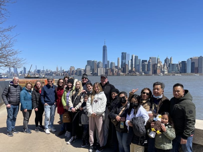 group photo in front of manhattan