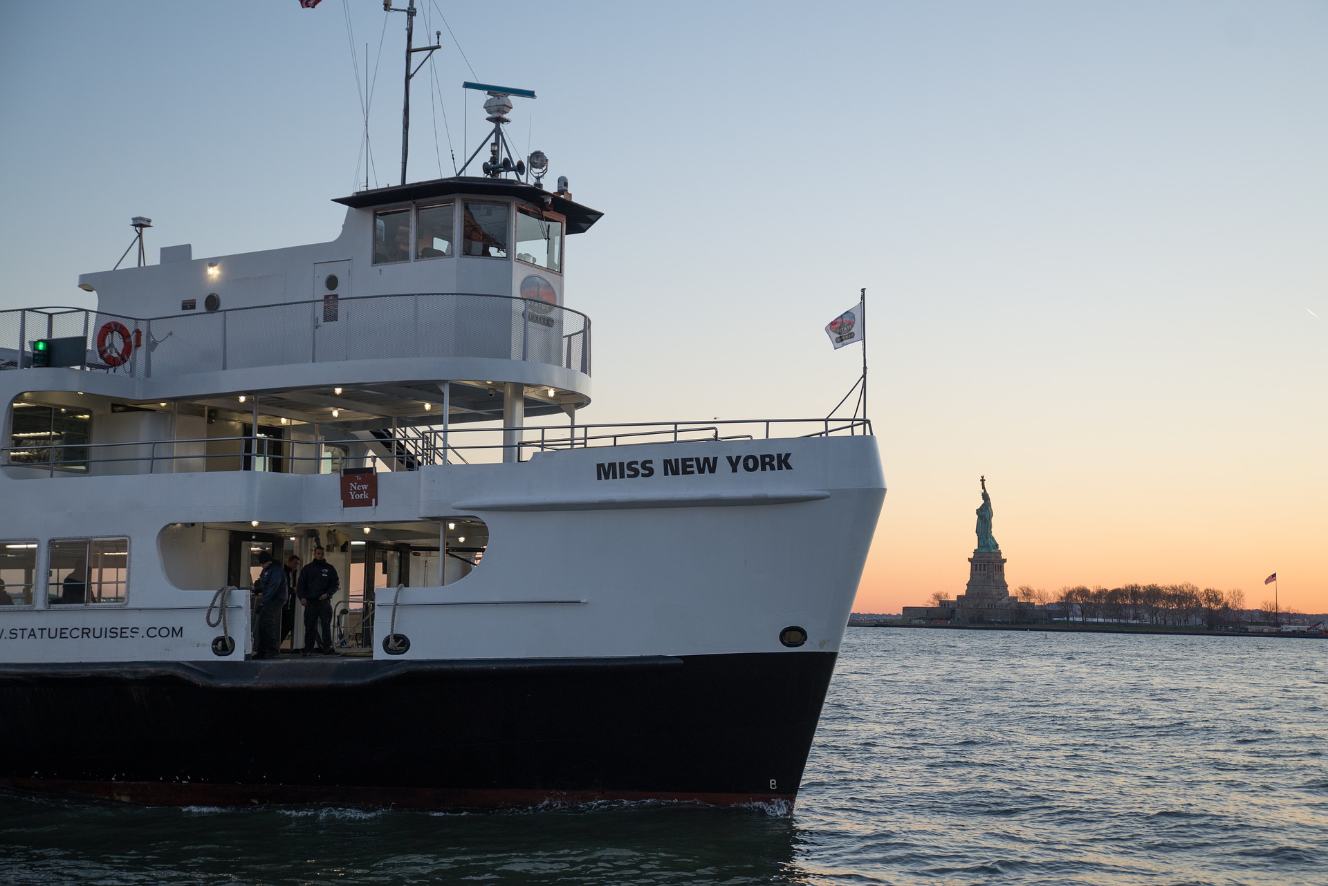 Statue Cruises Ferry with Statue of Liberty in Background