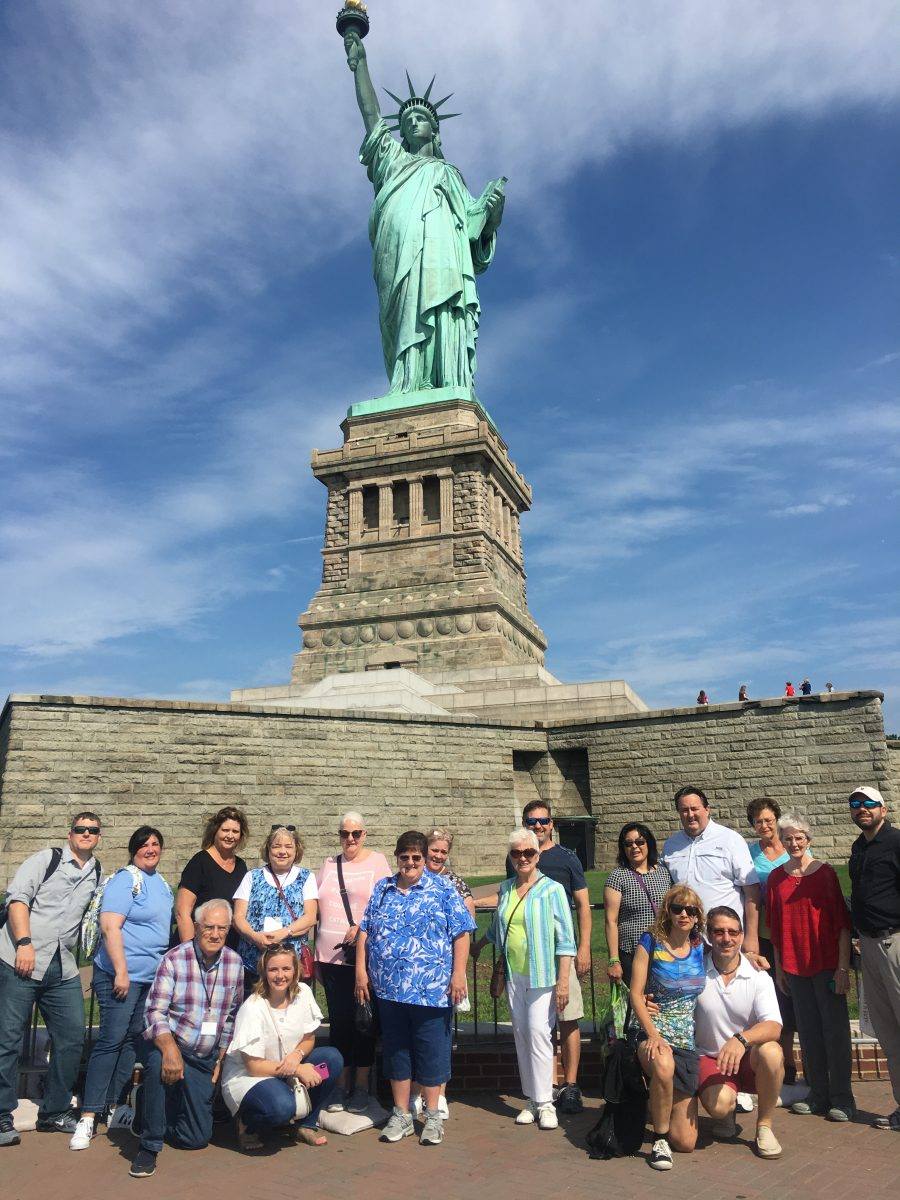 Tour Group in front of Statue of Liberty