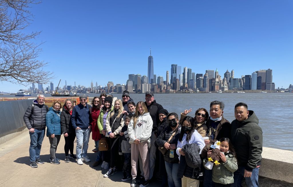 group photo in front of manhattan