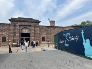 Castle Clinton entrance with Statute of Liberty banner