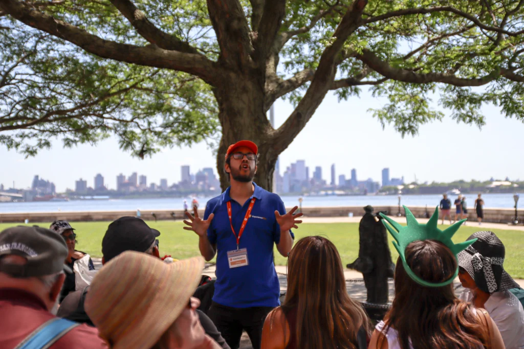 Tour guide and group during Statue of Liberty and Ellis Island tour