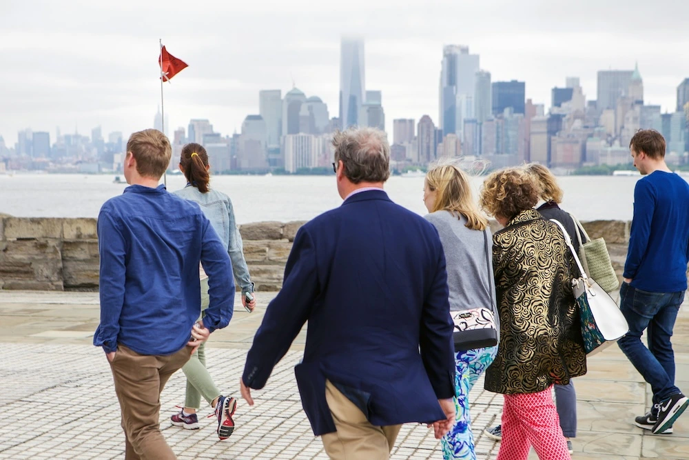 Statue of Liberty tour group walking with guide