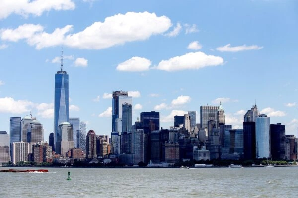 View of NYC cityscape from Liberty Island during Private Statue of Liberty and Ellis Island Express Tour